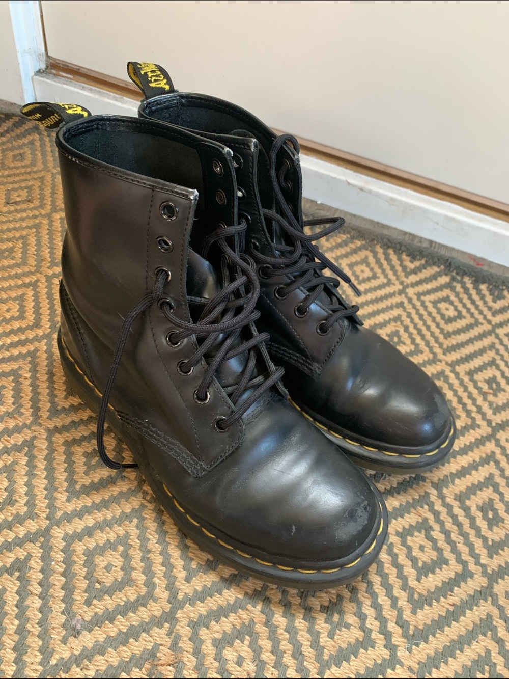 Dr. Martens Black Leather 8-Eye Lace-Up Boots with Yellow Stitching